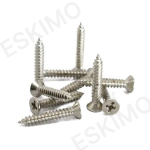 A pile of silver Eskimo brand screws with flat heads on a white background.