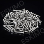 A pile of small, stainless steel wood screws with Phillips-head drives, scattered on a dark, reflective surface.
